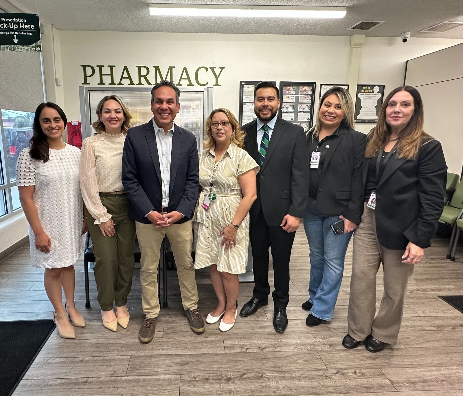 Rep. Pete Aguilar stands with staff at Bloomington Community Health Center.